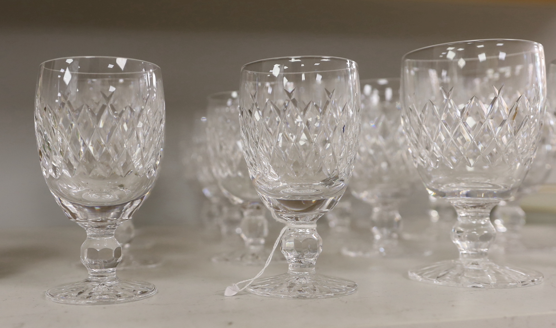 Sixteen Waterford crystal glasses, tallest 13cm high
